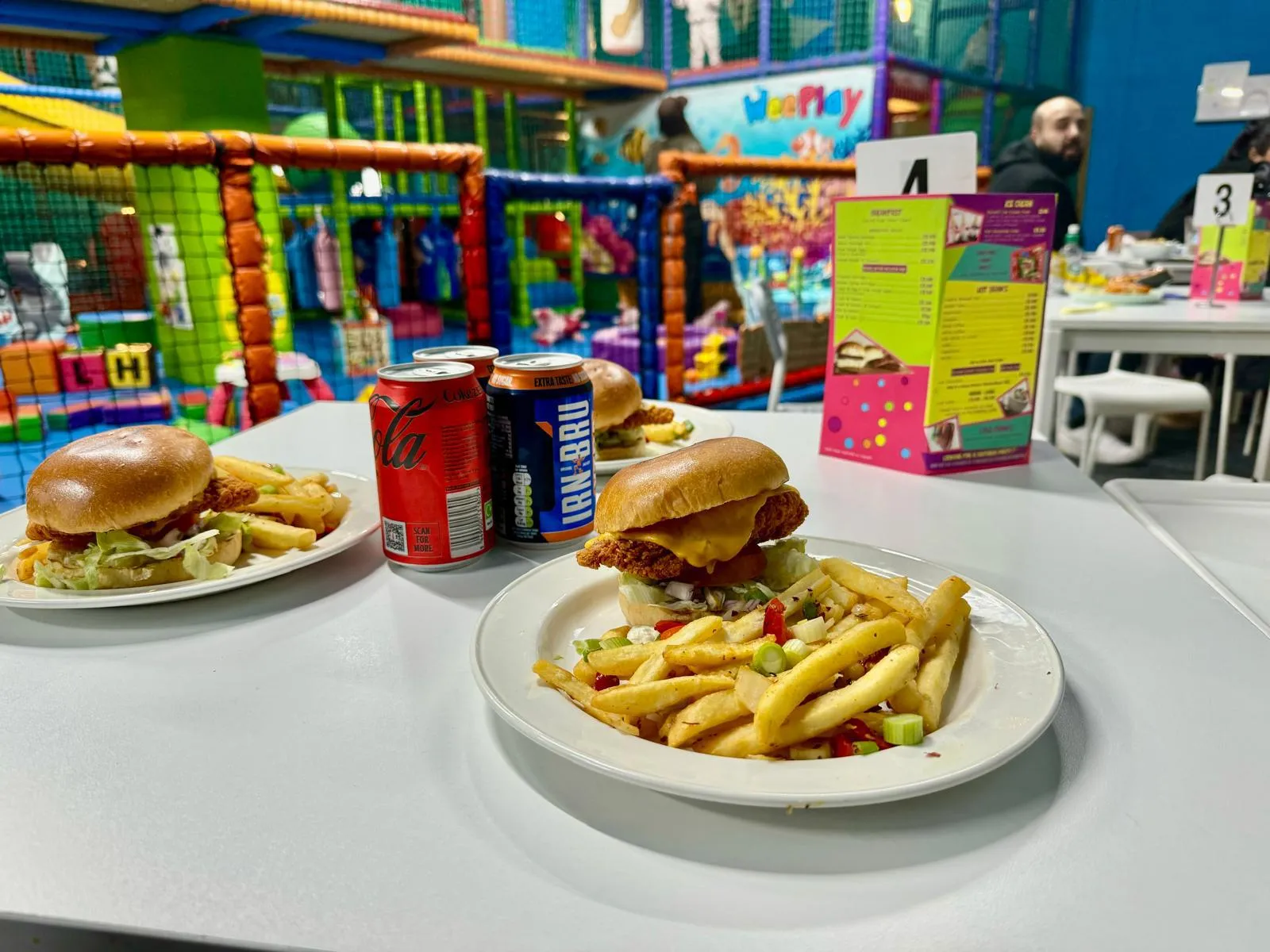 WeePlay burgers and chips served at the café tables